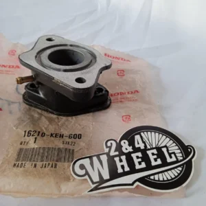 HONDA CARBURETOR INSULATOR INTAKE MANIFOLD 16210-KEH-600 GENUINE