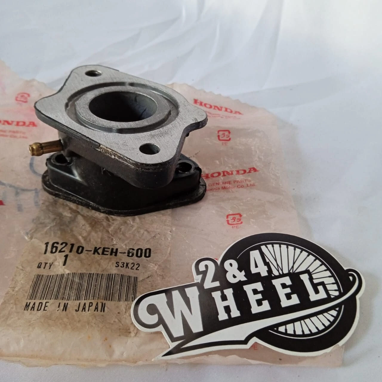 HONDA CARBURETOR INSULATOR INTAKE MANIFOLD 16210-KEH-600 GENUINE