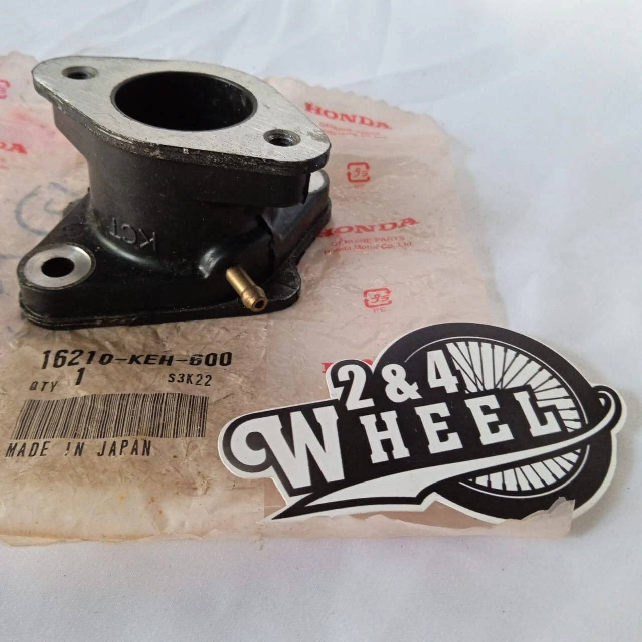 HONDA CARBURETOR INSULATOR INTAKE MANIFOLD 16210-KEH-600 GENUINE - Image 2